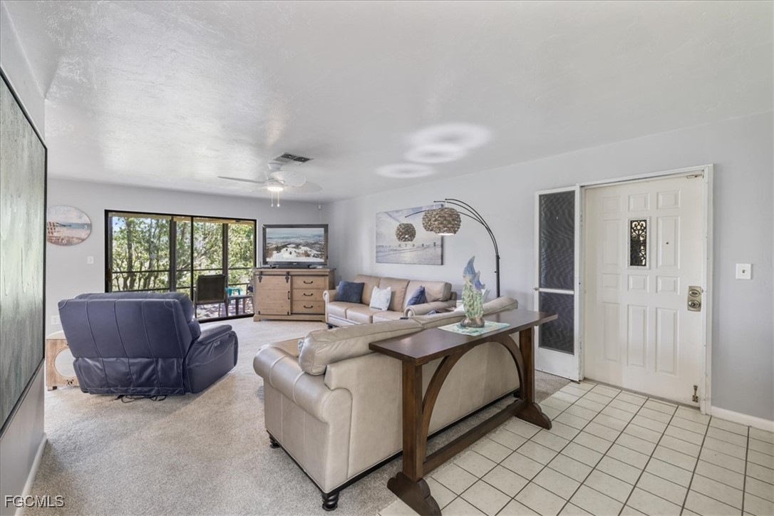 4728 Orange Grove Boulevard, Unit 8 North Fort Myers, FL 33903 - Photo 2 of 31 a living room with furniture