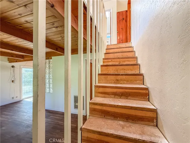 a view of entryway with wooden floor