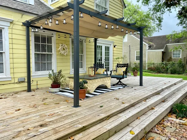 a view of a lounge chair in the patio of the house