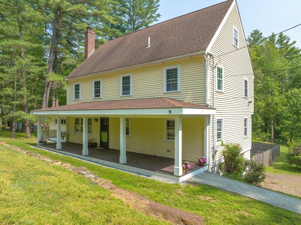 17 Highland Road Boxford, MA 01921 - Photo 1 of 42 a view of a house with a yard and plants