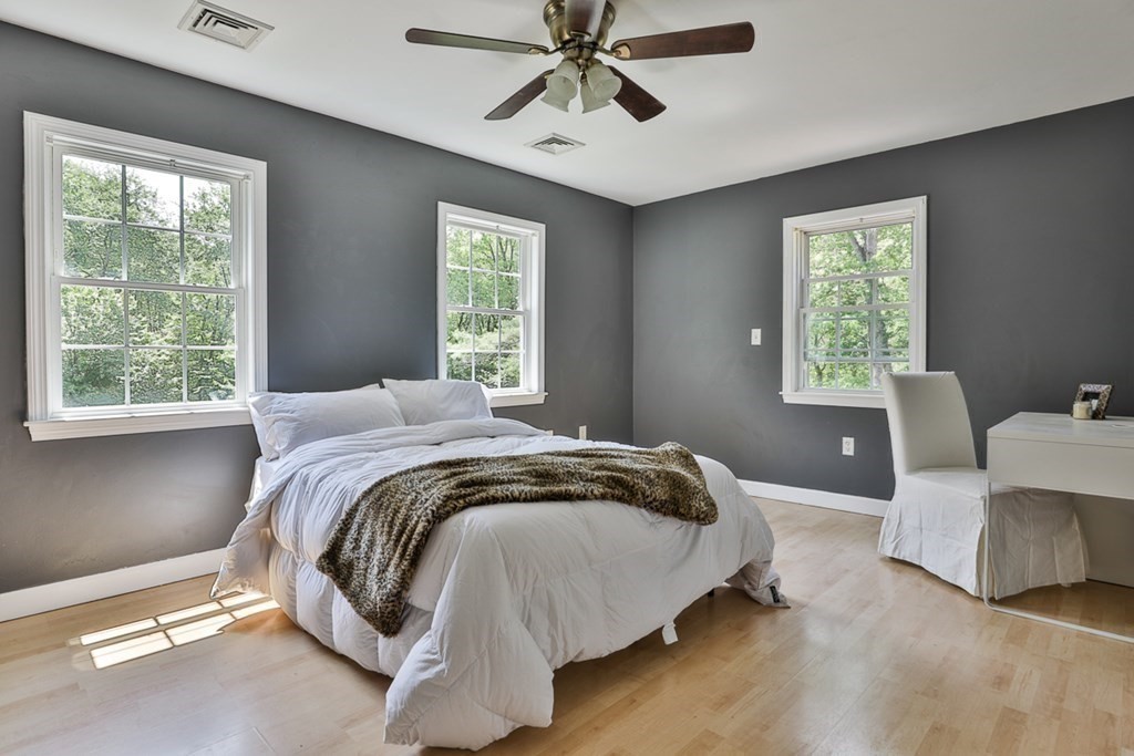 17 Highland Road Boxford, MA 01921 - Photo 23 of 42 a bedroom with a bed and window