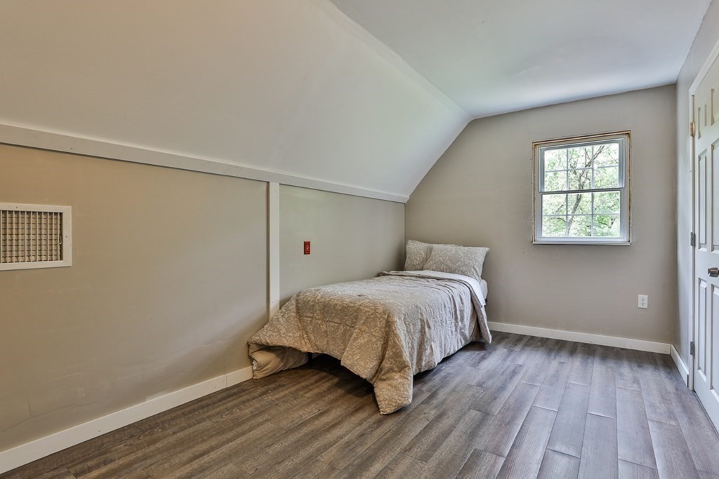 17 Highland Road Boxford, MA 01921 - Photo 28 of 42 a bedroom with a bed and a window