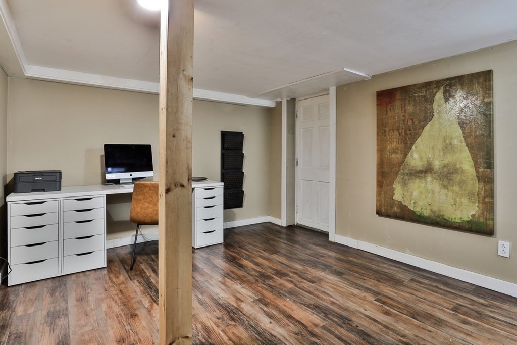 17 Highland Road Boxford, MA 01921 - Photo 31 of 42 a view of a bedroom with furniture and wooden floor
