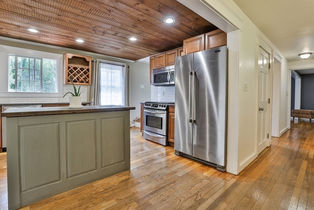 17 Highland Road Boxford, MA 01921 - Photo 6 of 42 a kitchen with stainless steel appliances granite countertop a refrigerator and a sink