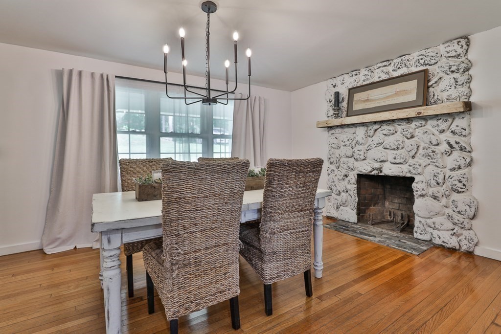 17 Highland Road Boxford, MA 01921 - Photo 9 of 42 a living room with furniture and a fireplace