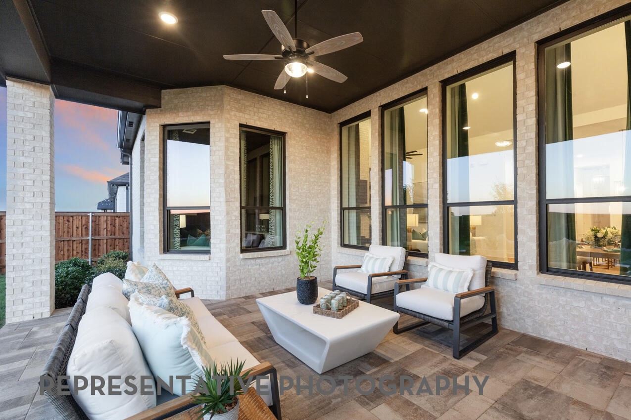 18918 Moonriver Street Conroe, TX 77302 - Photo 19 of 25 a living room with furniture and floor to ceiling windows
