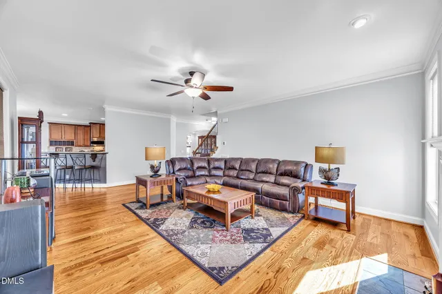 a living room with furniture and a rug