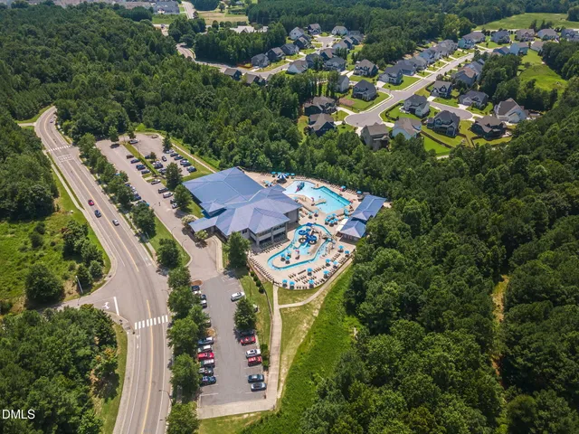 an aerial view of a house with a garden
