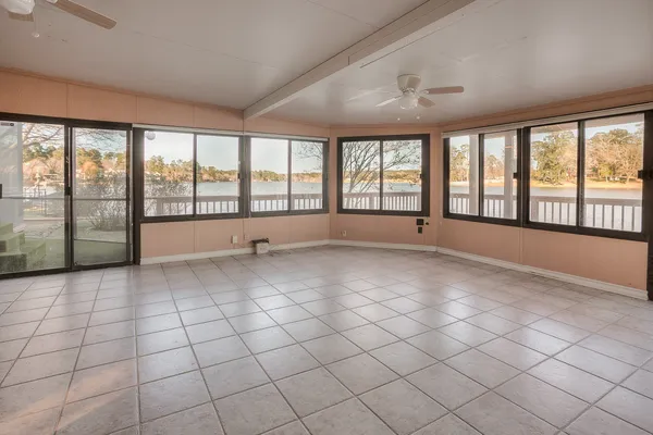 a view of an empty room and window