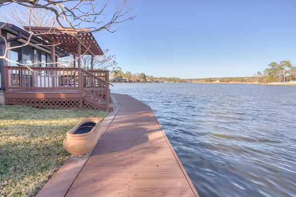 a view of a backyard with sitting area