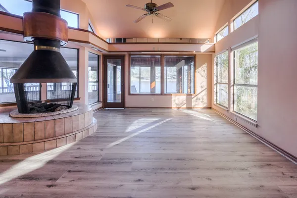 a view of livingroom with furniture wooden floor and window