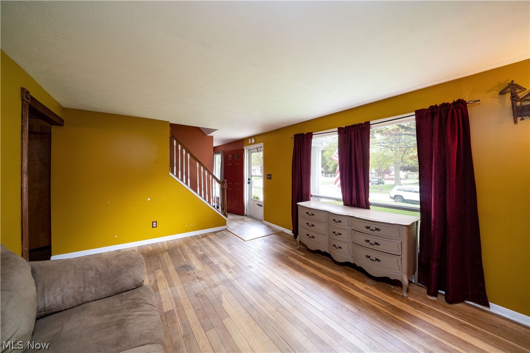 3754 Vira Road Stow, OH 44224 - Photo 9 of 35 3754 Vira Rd, Stow, OH 44224 won't last long! 4 Bedrooms & full bath on the 2nd floor as well as half bath on the 1st floor, separate Living Room, Family Room with beautiful Fireplace, gorgeous Sunroom with sliding doors to the huge deck with fenced rear yard & tool shed, Kitchen & Dining Room with wood floors; Full basement with half finished for recreation Room & other half as workshop & Hobby area as well as Laundry Hookups & Utilities.