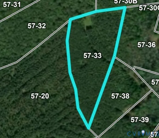 a view of a sign in front of tree