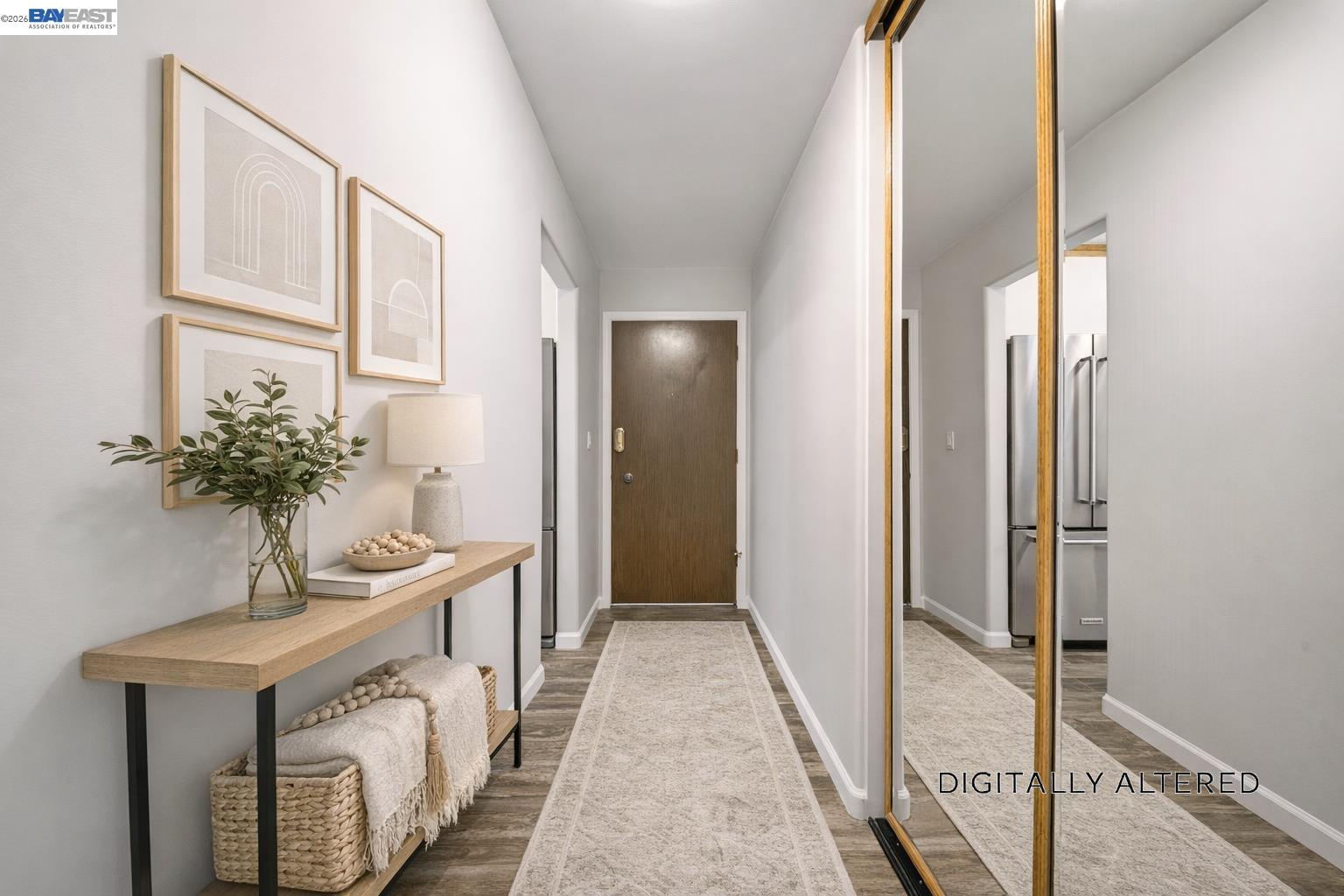 960 Shorepoint Court, Unit 116 Alameda, CA 94501 - Photo 5 of 20 a view of a hallway to a livingroom with furniture