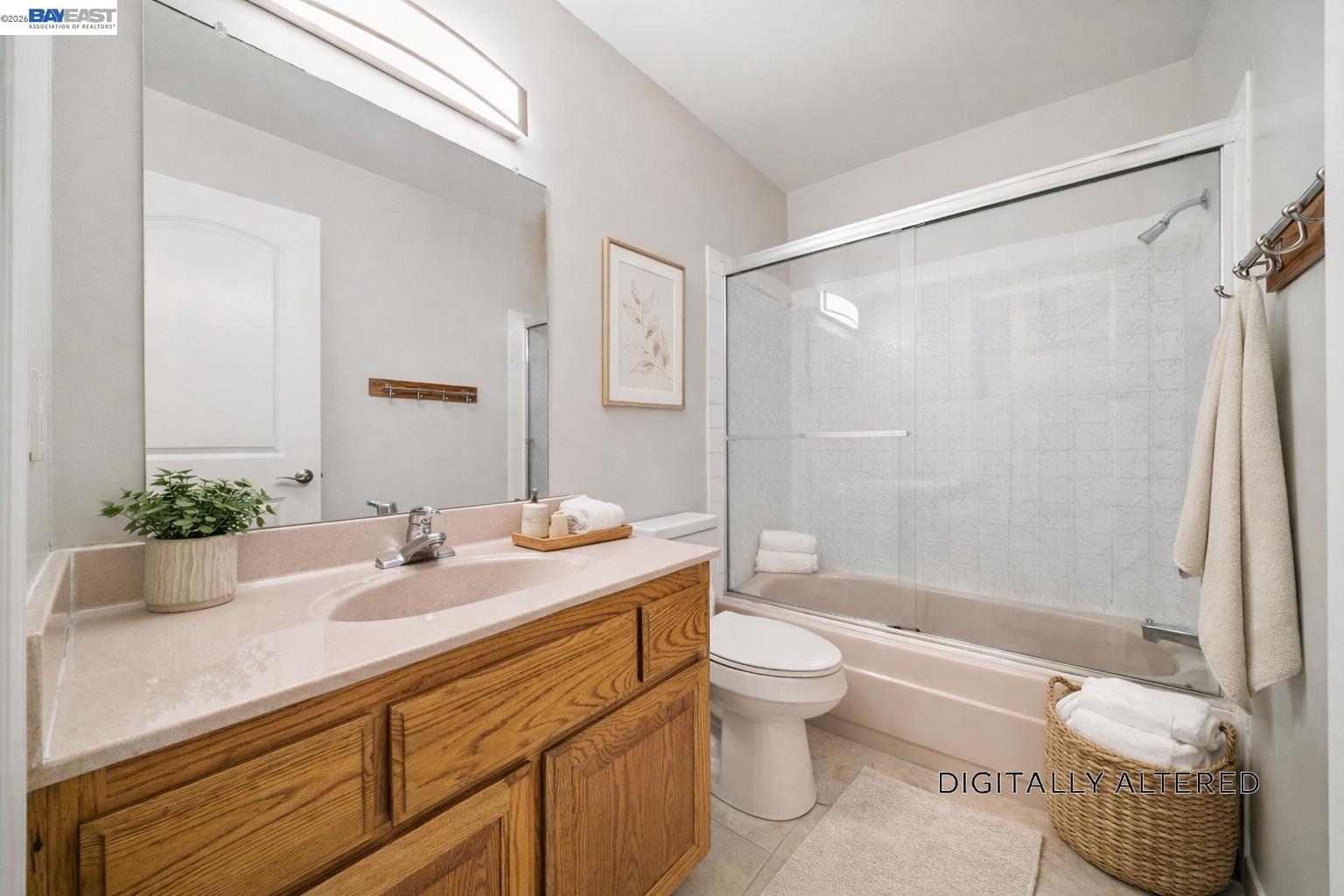 960 Shorepoint Court, Unit 116 Alameda, CA 94501 - Photo 10 of 20 a bathroom with a granite countertop sink toilet and shower