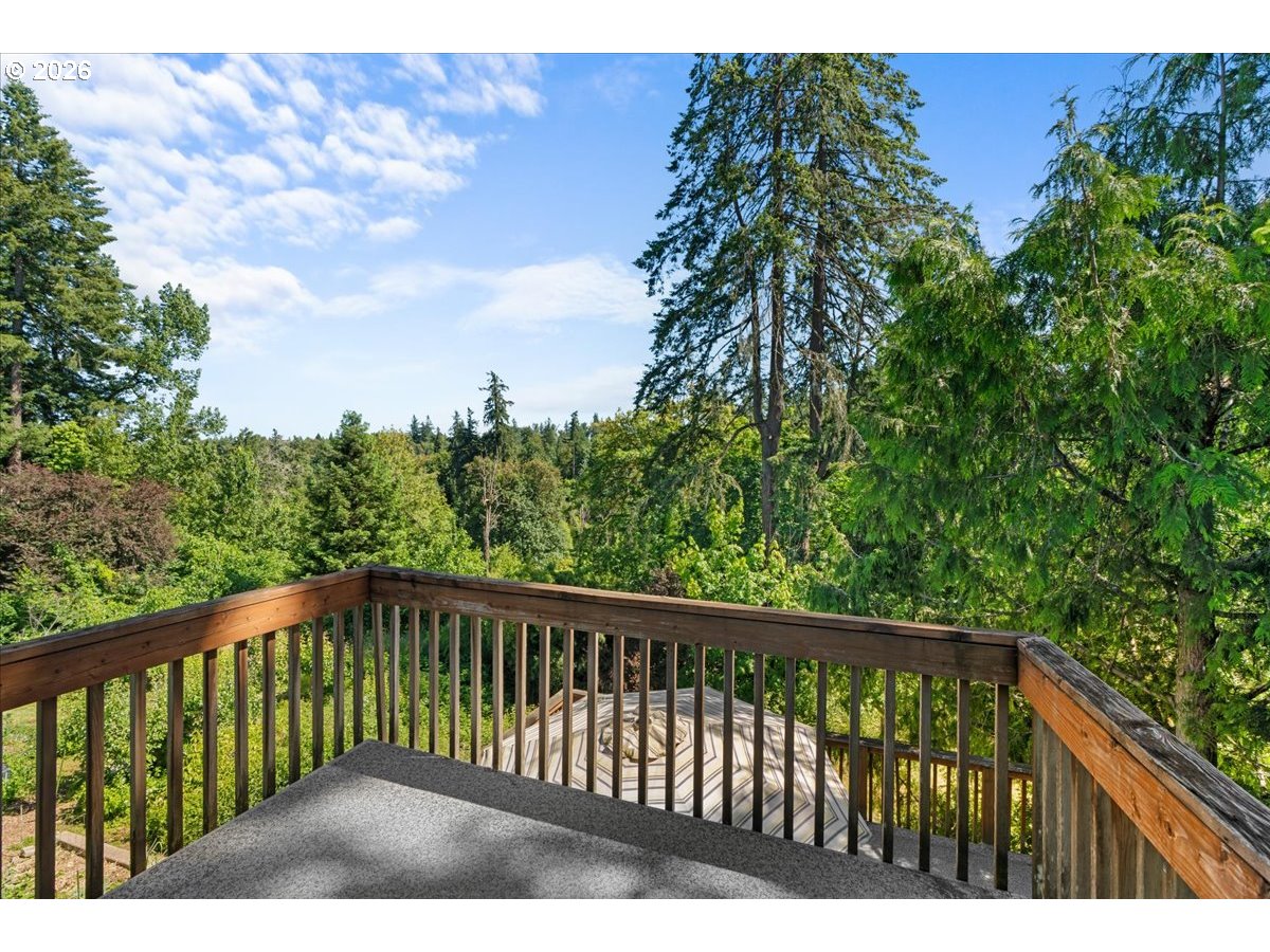 772 Division Street Oregon City, OR 97045 - Photo 15 of 47 a balcony with wooden fence