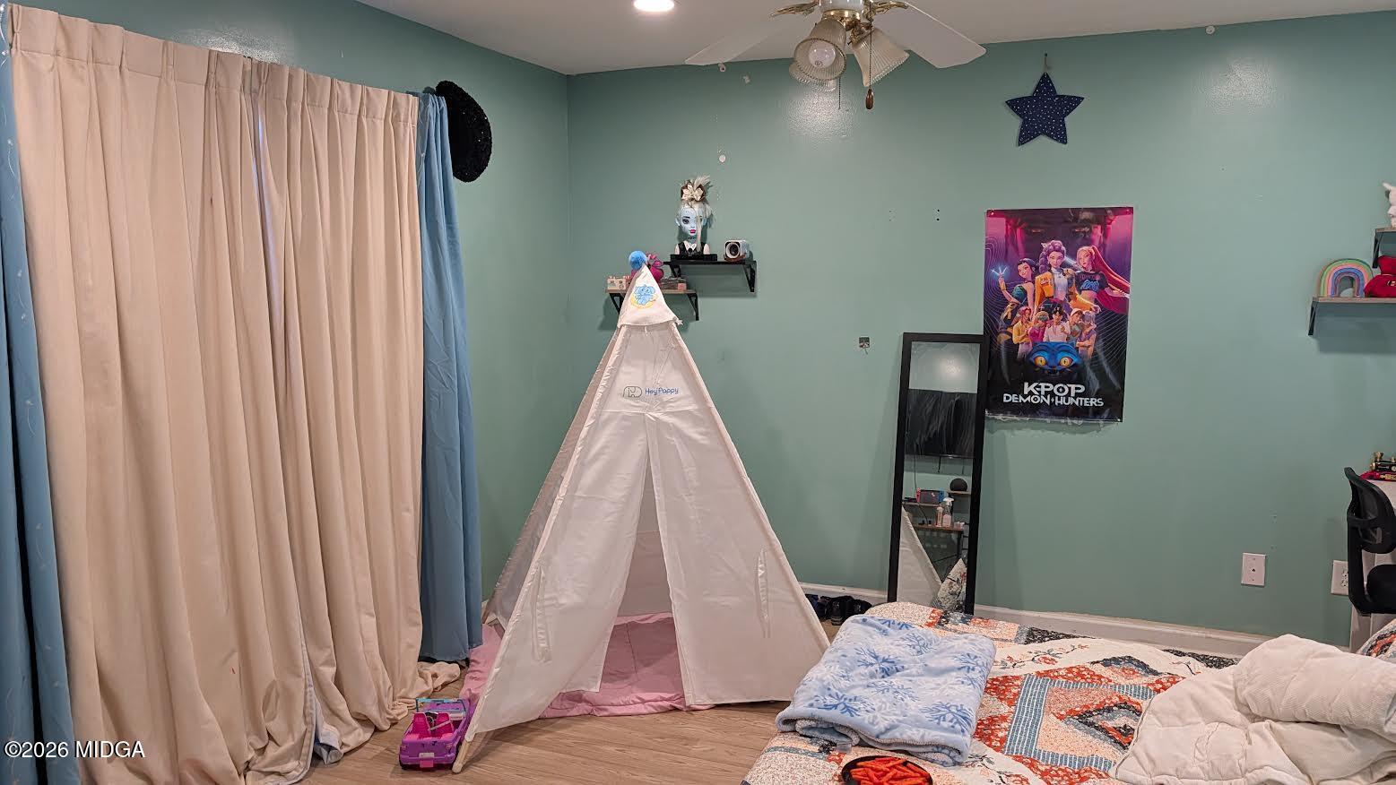 167 Apple Valley Road Macon, GA 31217 - Photo 13 of 22 a bedroom with a bed and a window