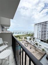 9273 Collins Avenue, Unit 801 Surfside, FL 33154 - Photo 1 of 15 a view of a city from a balcony