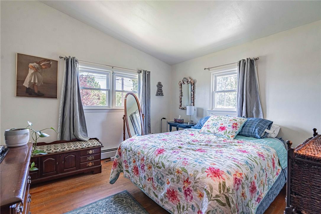 579 Cherry Road Northampton, PA 18067 - Photo 32 of 57 Bright windows and warm hardwood flooring define this inviting bedroom retreat.