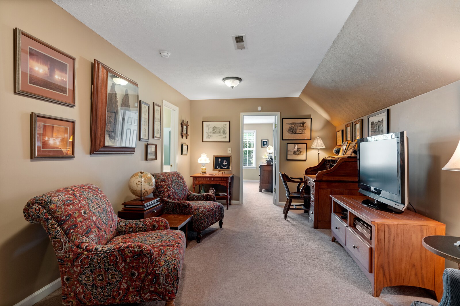 6028 State Line Road Springfield, TN 37172 - Photo 39 of 45 a living room with furniture and a flat screen tv