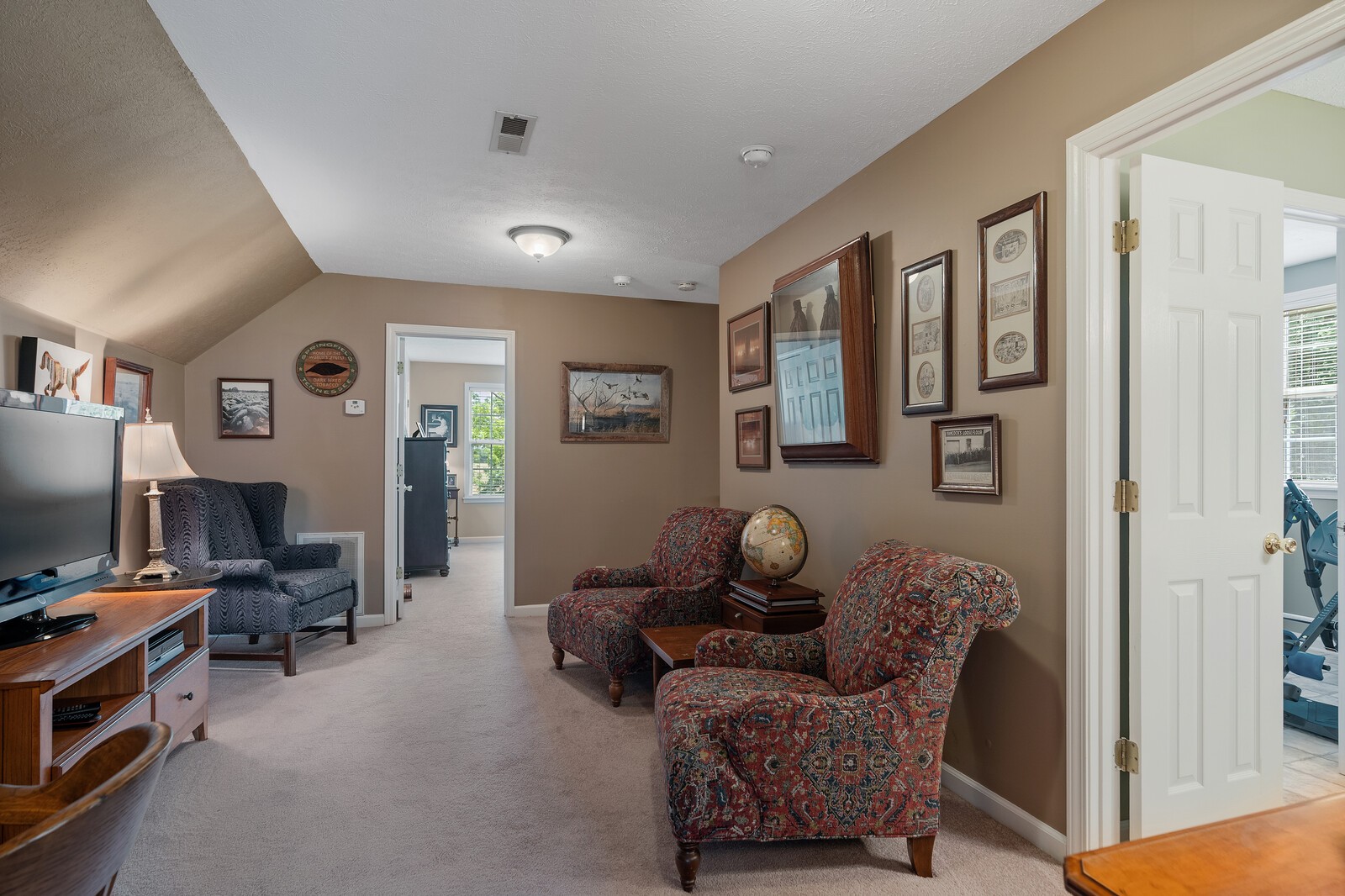 6028 State Line Road Springfield, TN 37172 - Photo 40 of 45 a living room with furniture and a flat screen tv