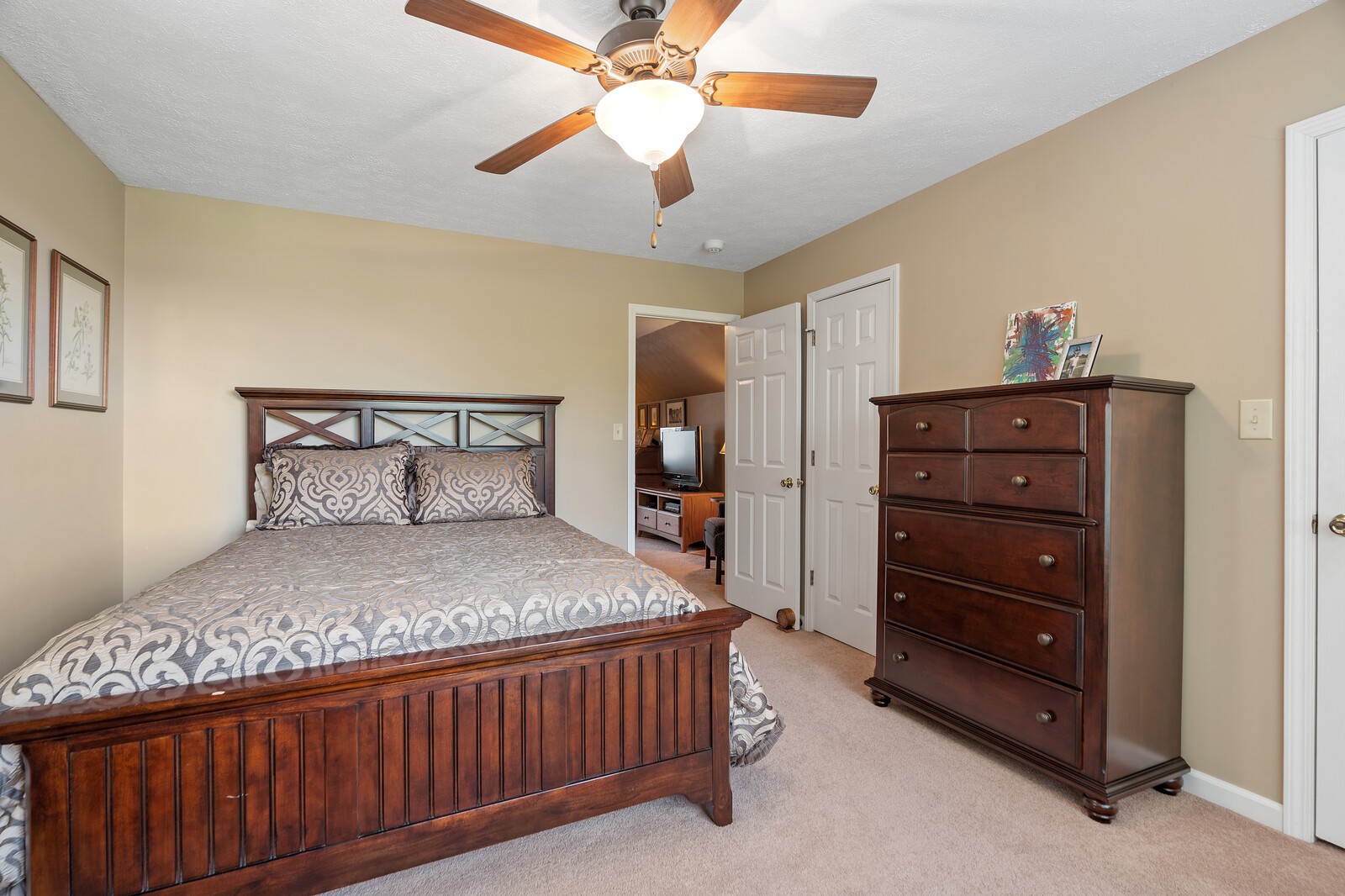 6028 State Line Road Springfield, TN 37172 - Photo 45 of 45 a bedroom with a bed and a chandelier