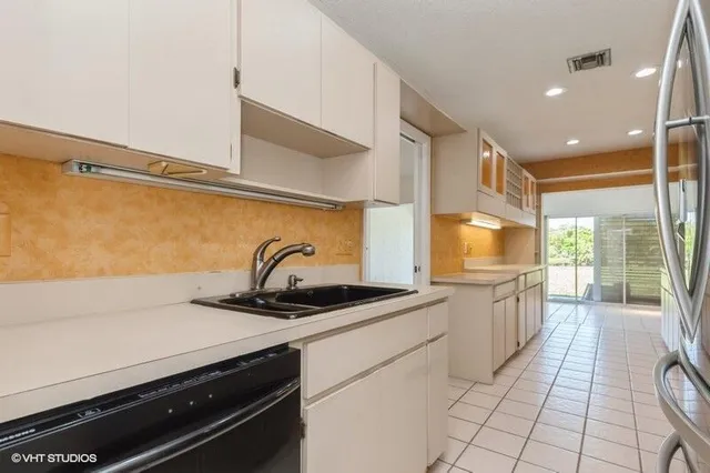 $269,900 | 148 Village Walk Drive, Unit 24, Royal Palm Beach, FL 33411