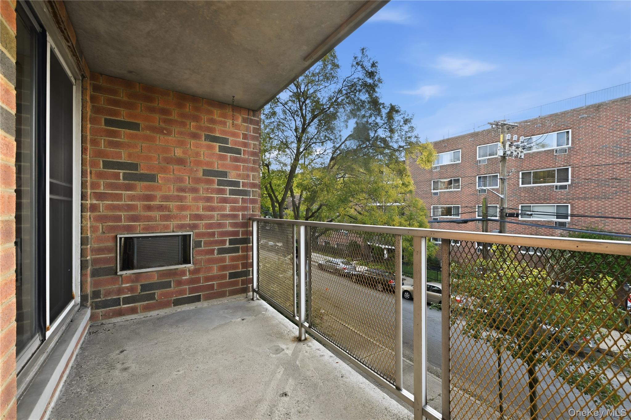 100 Clinton Avenue, Unit 2J Mineola, NY 11501 - Photo 16 of 24 a view of a balcony