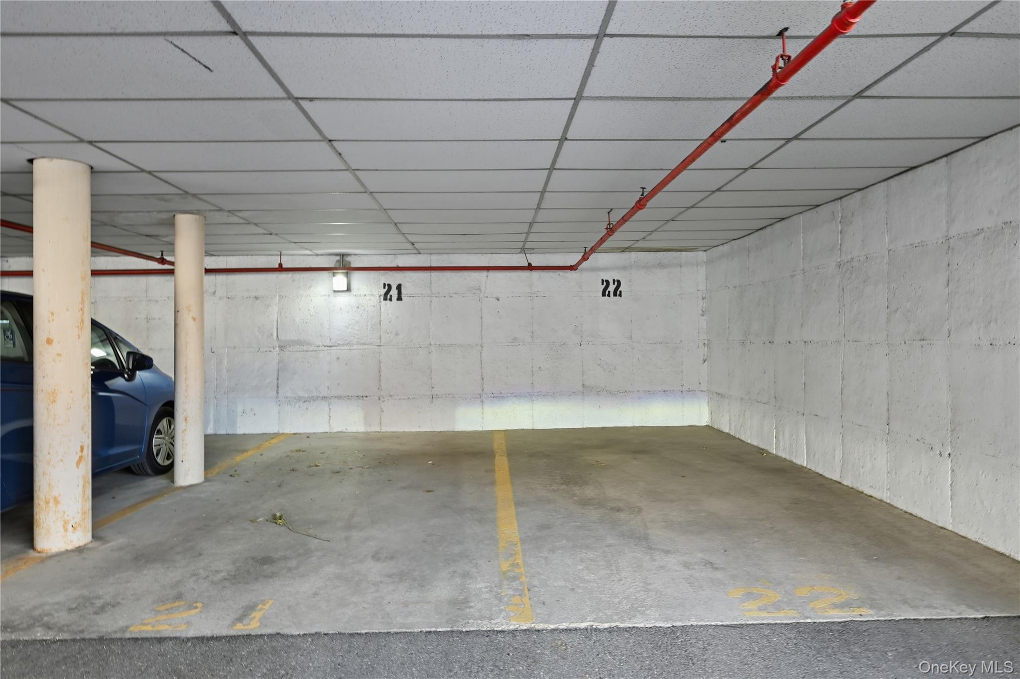 100 Clinton Avenue, Unit 2J Mineola, NY 11501 - Photo 18 of 24 a view of a room with an empty space