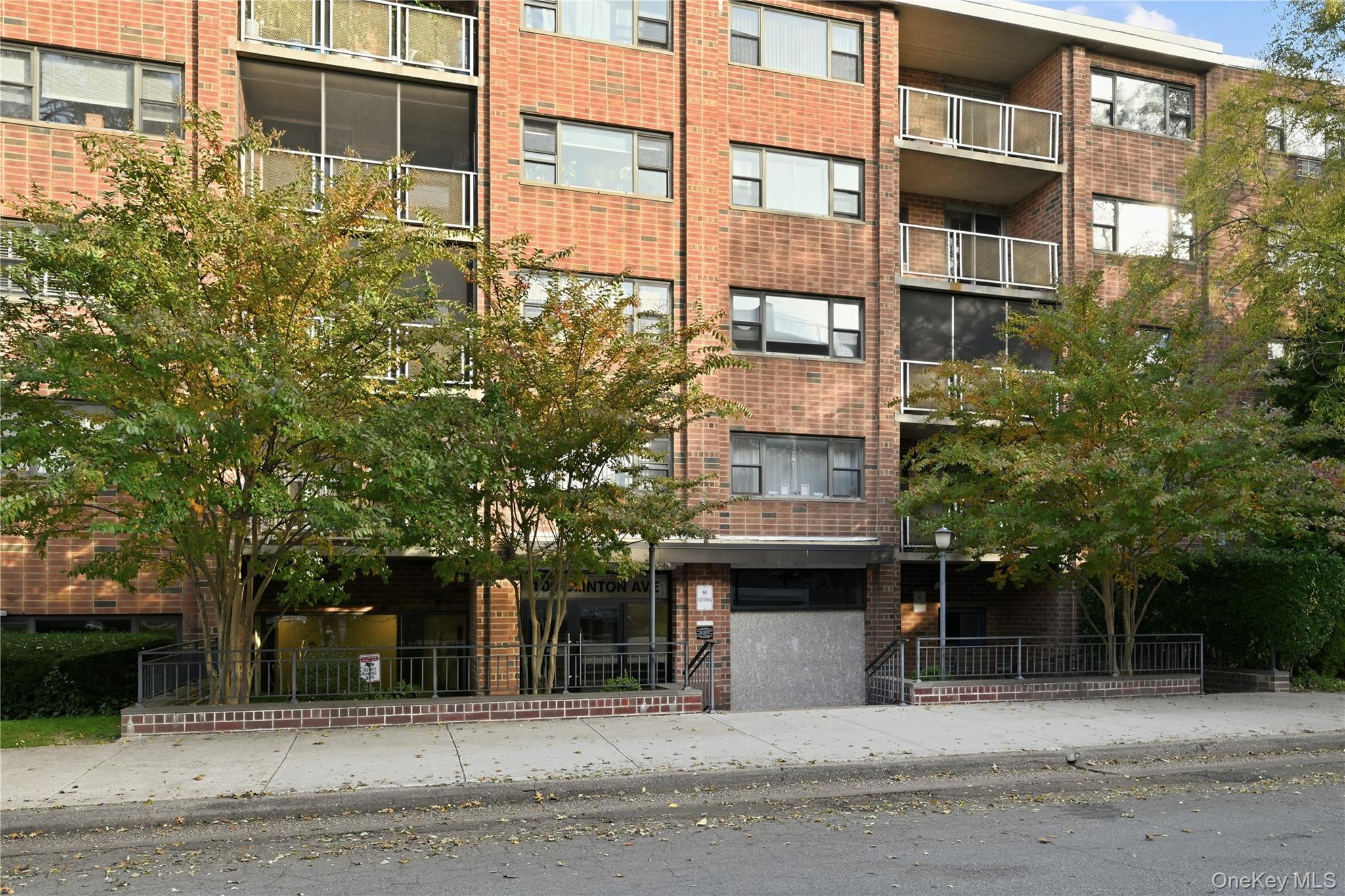 100 Clinton Avenue, Unit 2J Mineola, NY 11501 - Photo 21 of 24 front view of a building