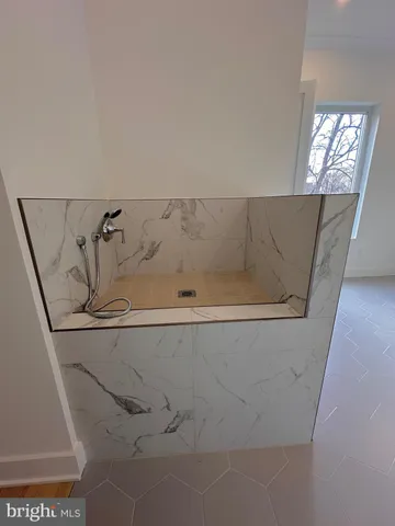 a bathroom with a bathtub
