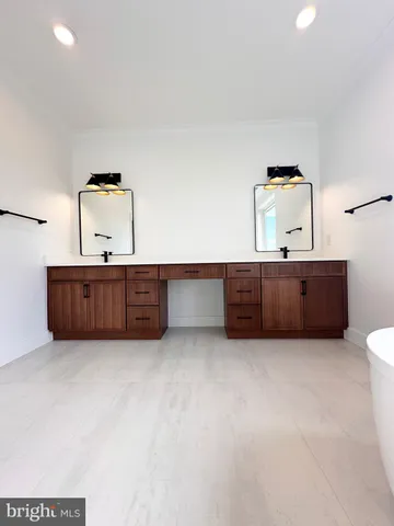 a kitchen with kitchen countertops and sink