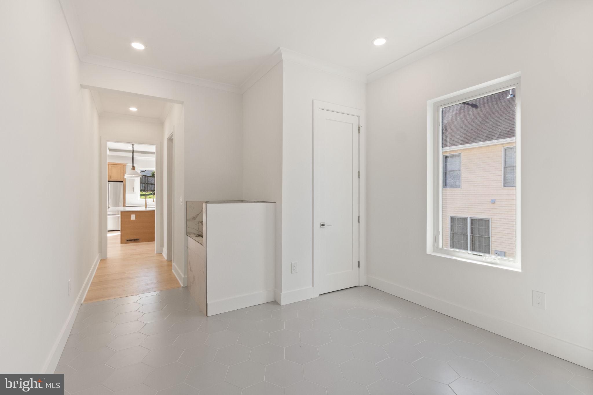 4017 Woodland Road Annandale, VA 22003 - Photo 34 of 76 a view of a big room with windows and entryway