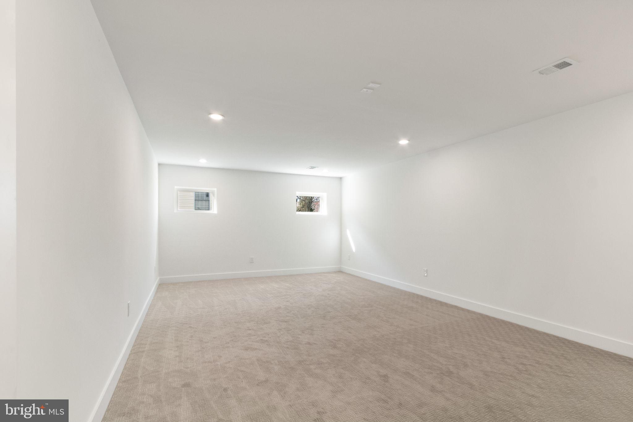 4017 Woodland Road Annandale, VA 22003 - Photo 61 of 76 an empty room with windows