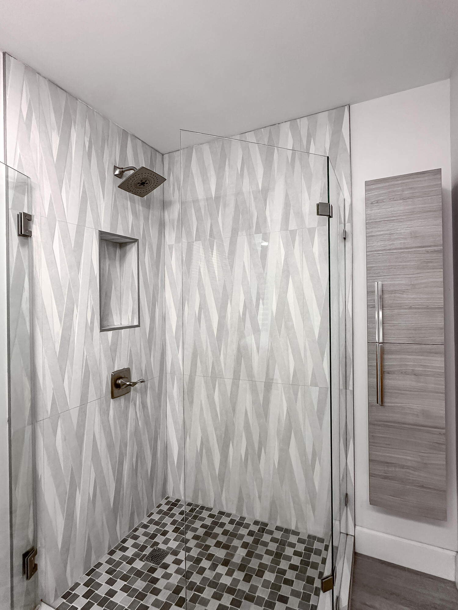 9871 Leeward Avenue Key Largo, FL 33037 - Photo 13 of 38 a bathroom with a shower and a shower curtain