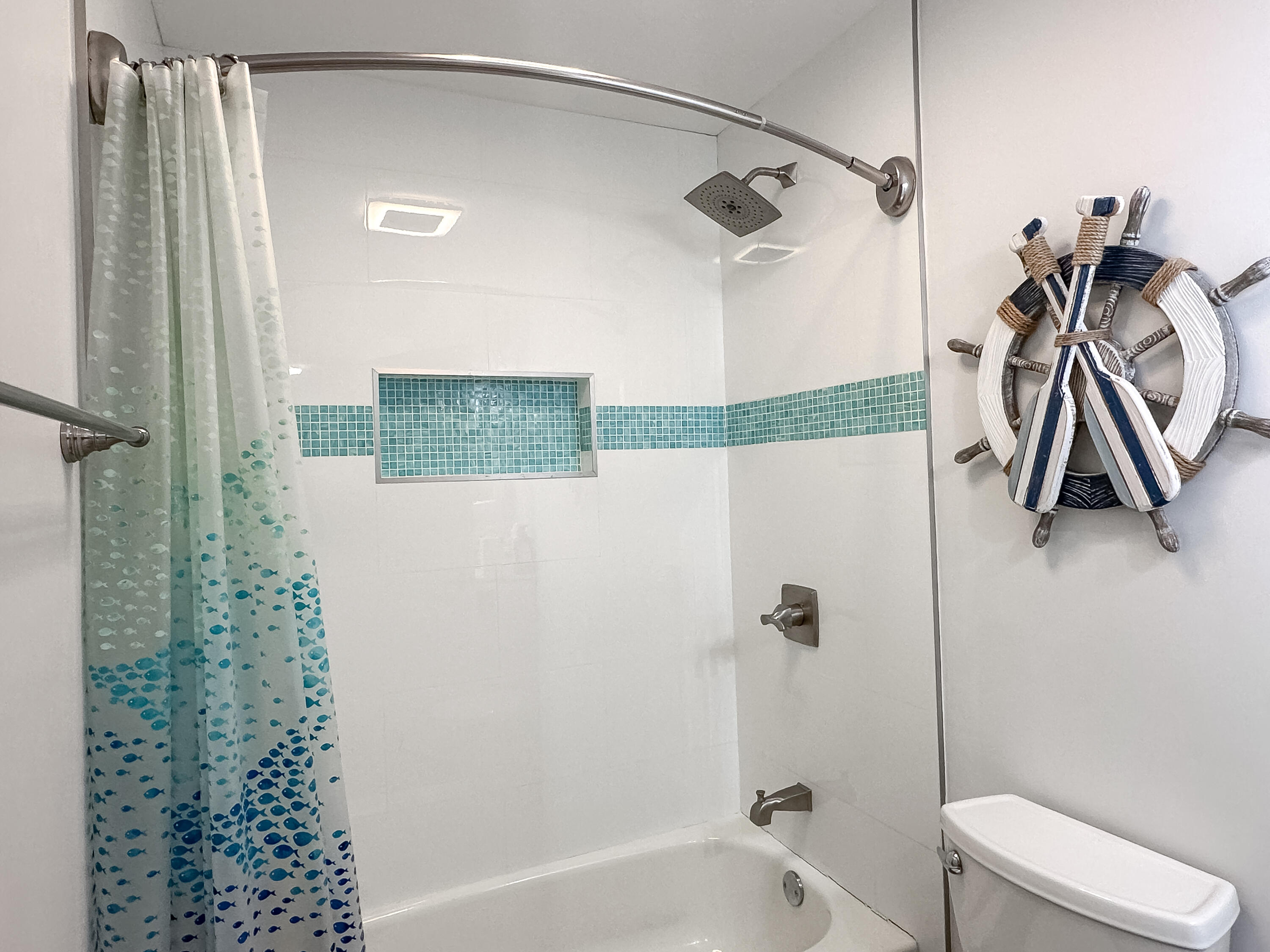 9871 Leeward Avenue Key Largo, FL 33037 - Photo 19 of 38 a bathroom with a shower a toilet and a shower