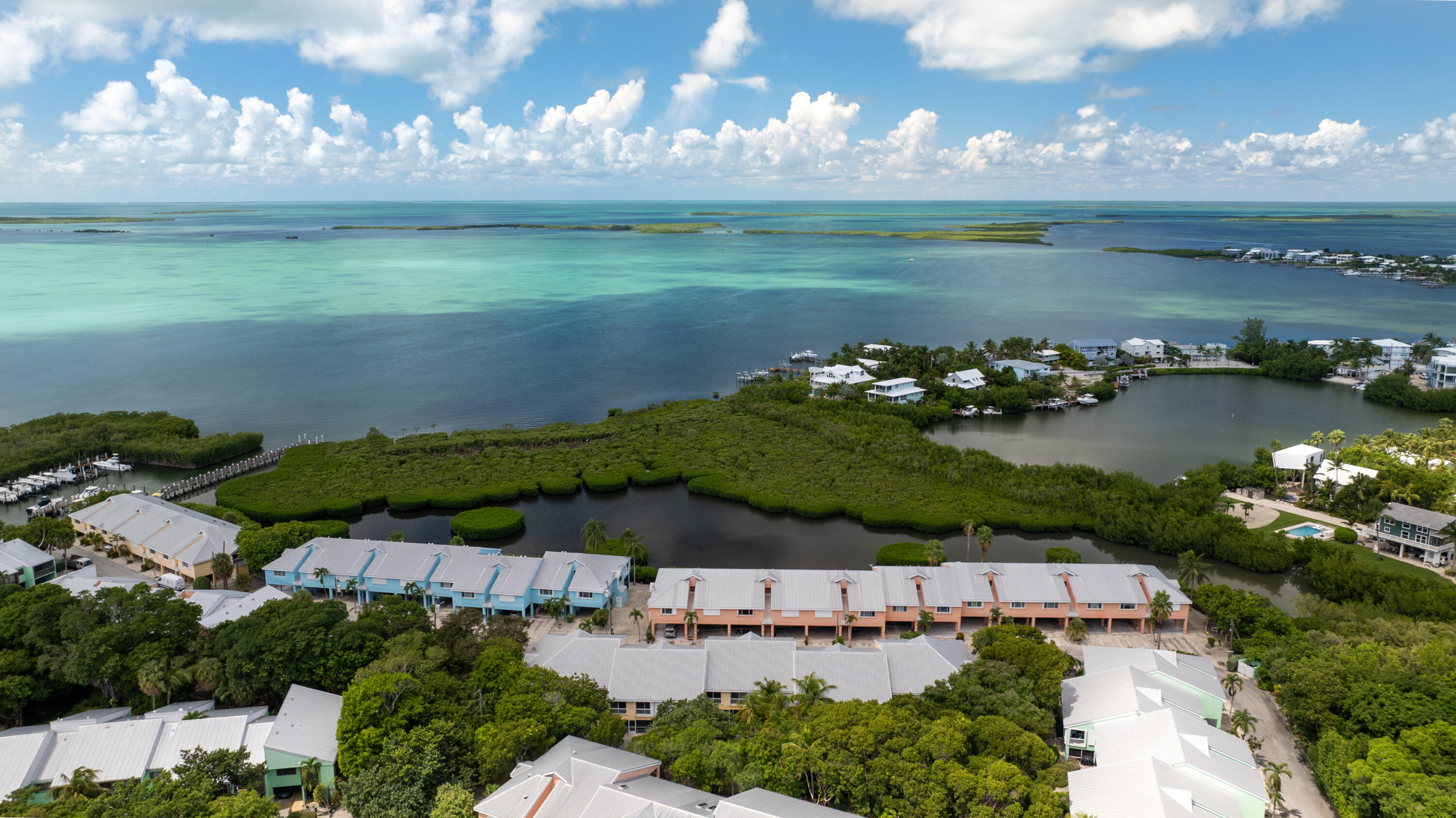 9871 Leeward Avenue Key Largo, FL 33037 - Photo 26 of 38 an aerial view of a house with a garden
