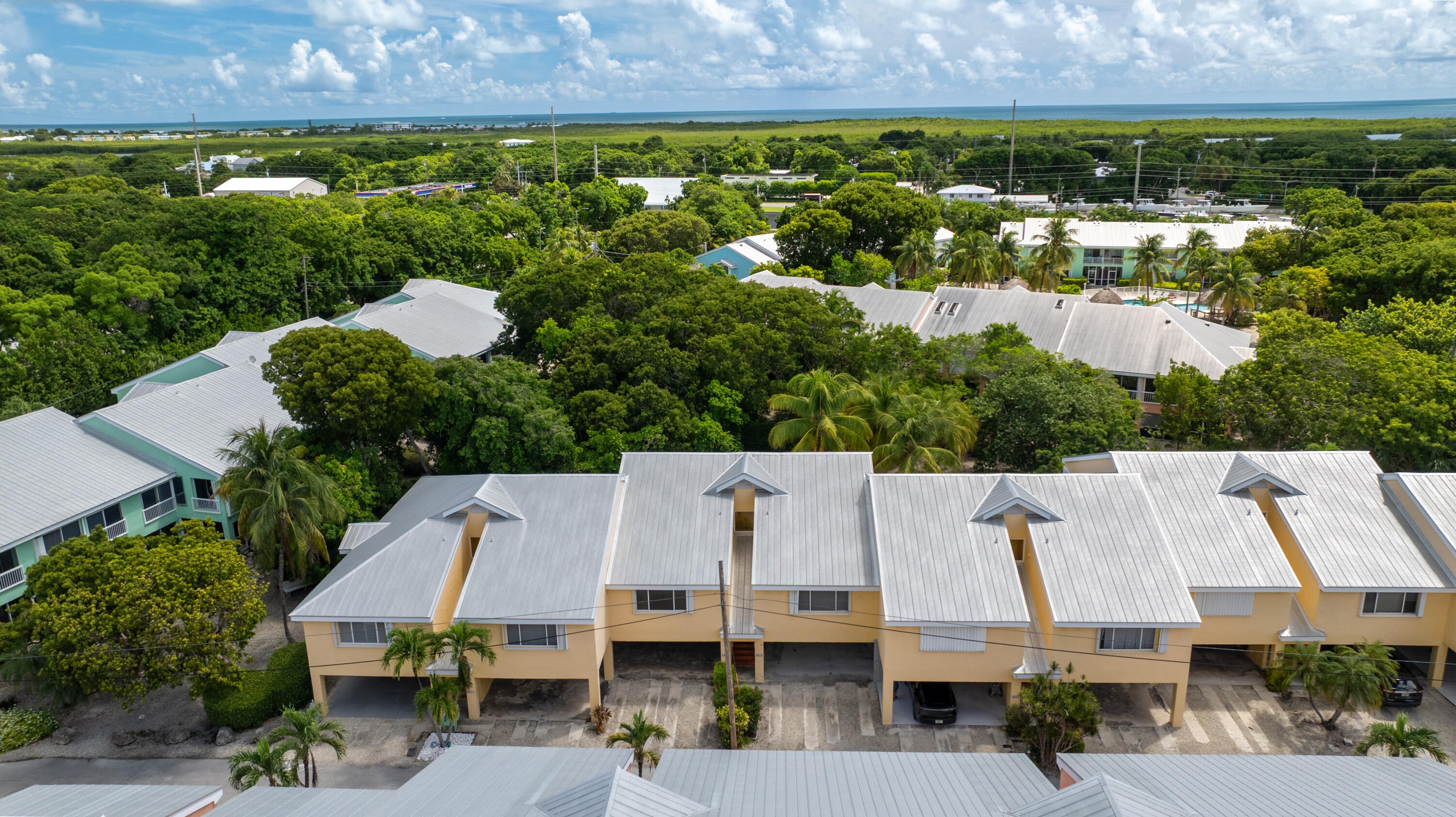 9871 Leeward Avenue Key Largo, FL 33037 - Photo 27 of 38 an aerial view of multiple house