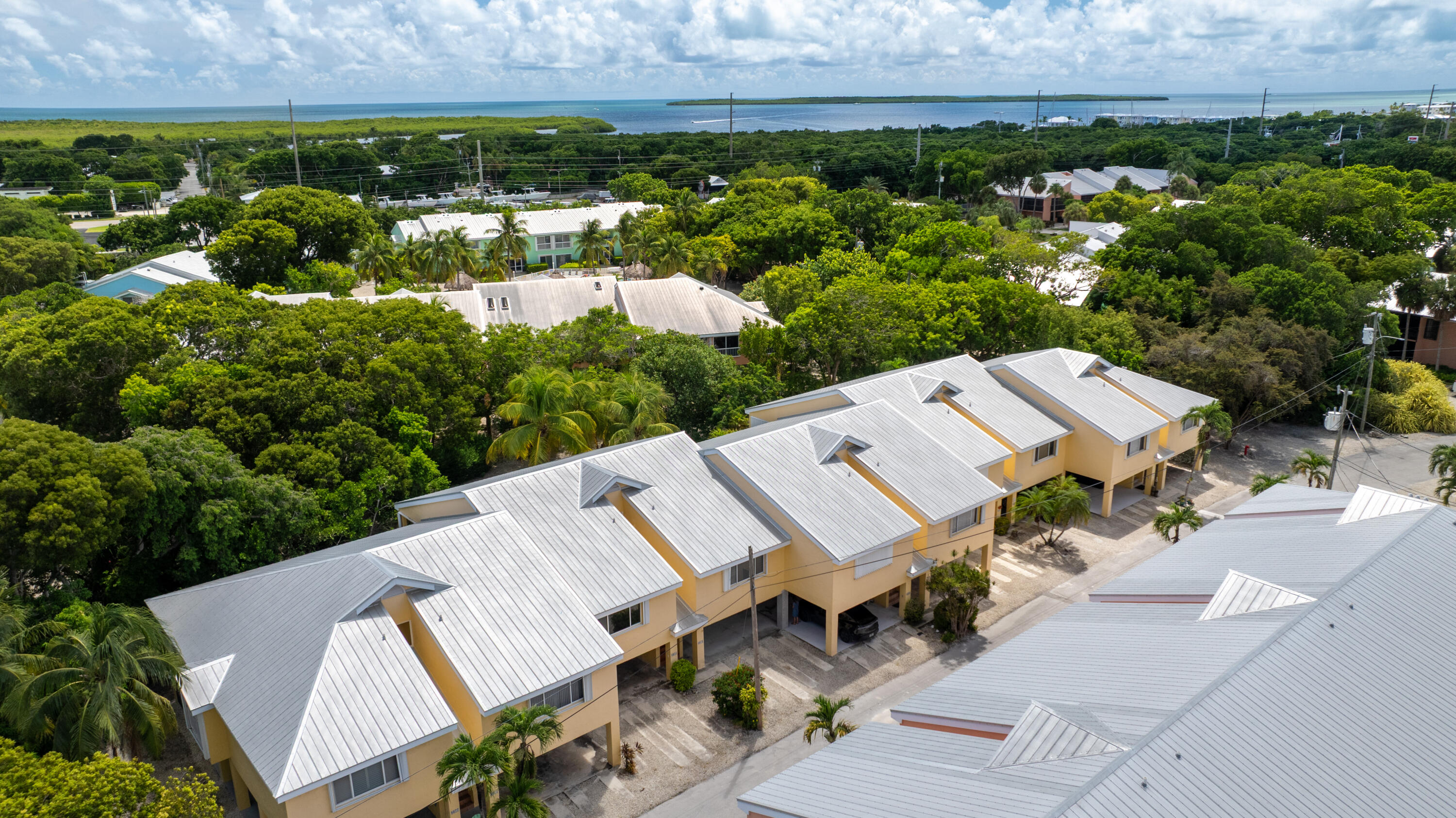 9871 Leeward Avenue Key Largo, FL 33037 - Photo 28 of 38 an aerial view of multiple house