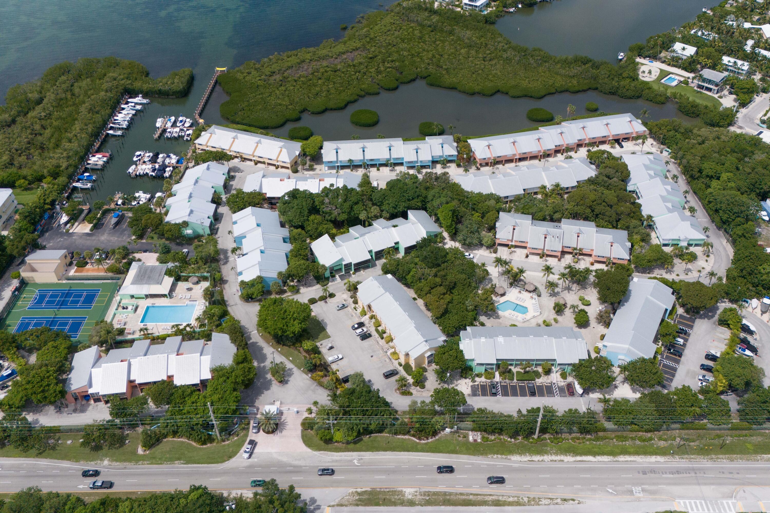 9871 Leeward Avenue Key Largo, FL 33037 - Photo 32 of 38 an aerial view of multiple house