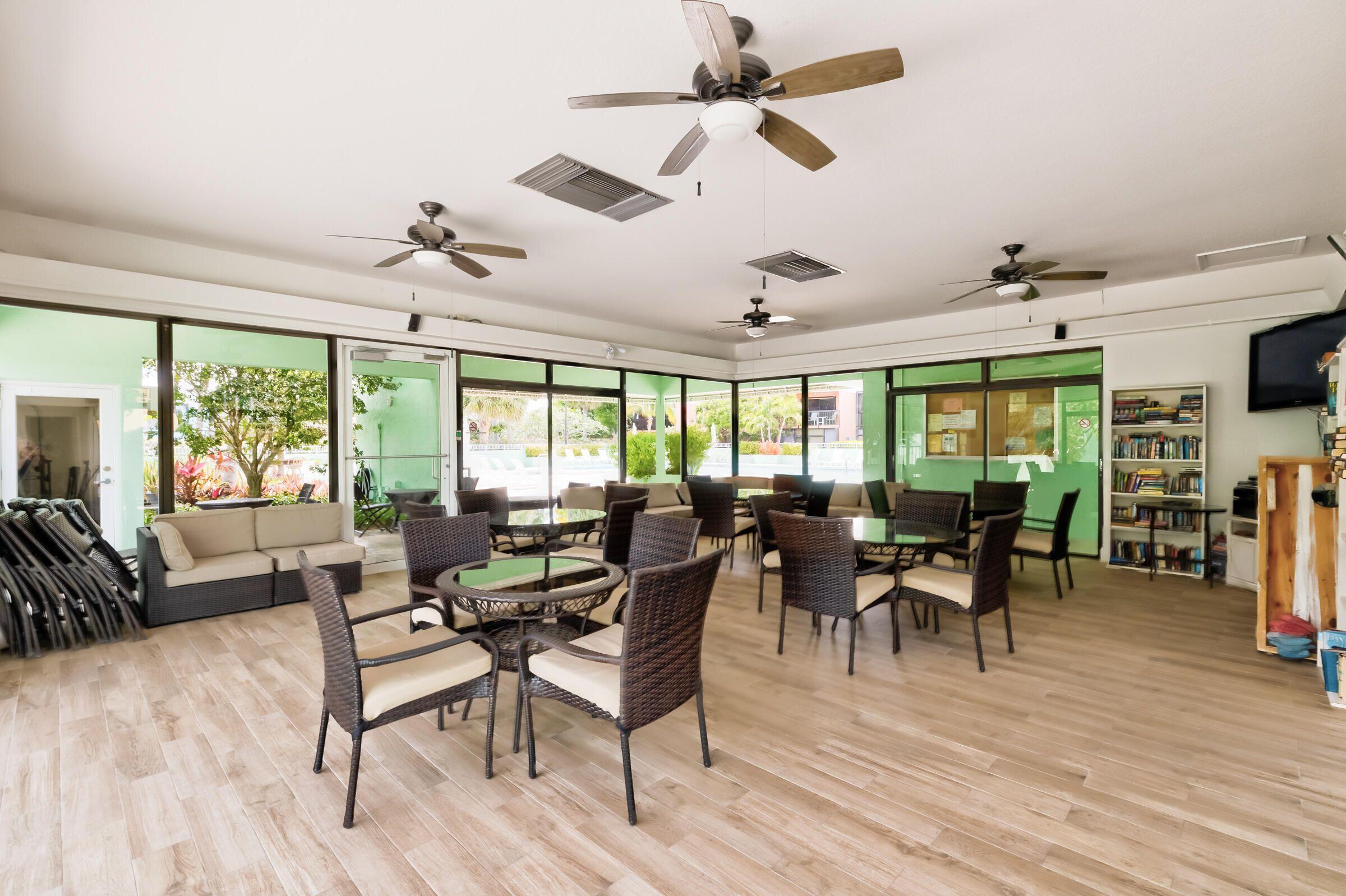 9871 Leeward Avenue Key Largo, FL 33037 - Photo 36 of 38 a view of a dining room with furniture window and outside view