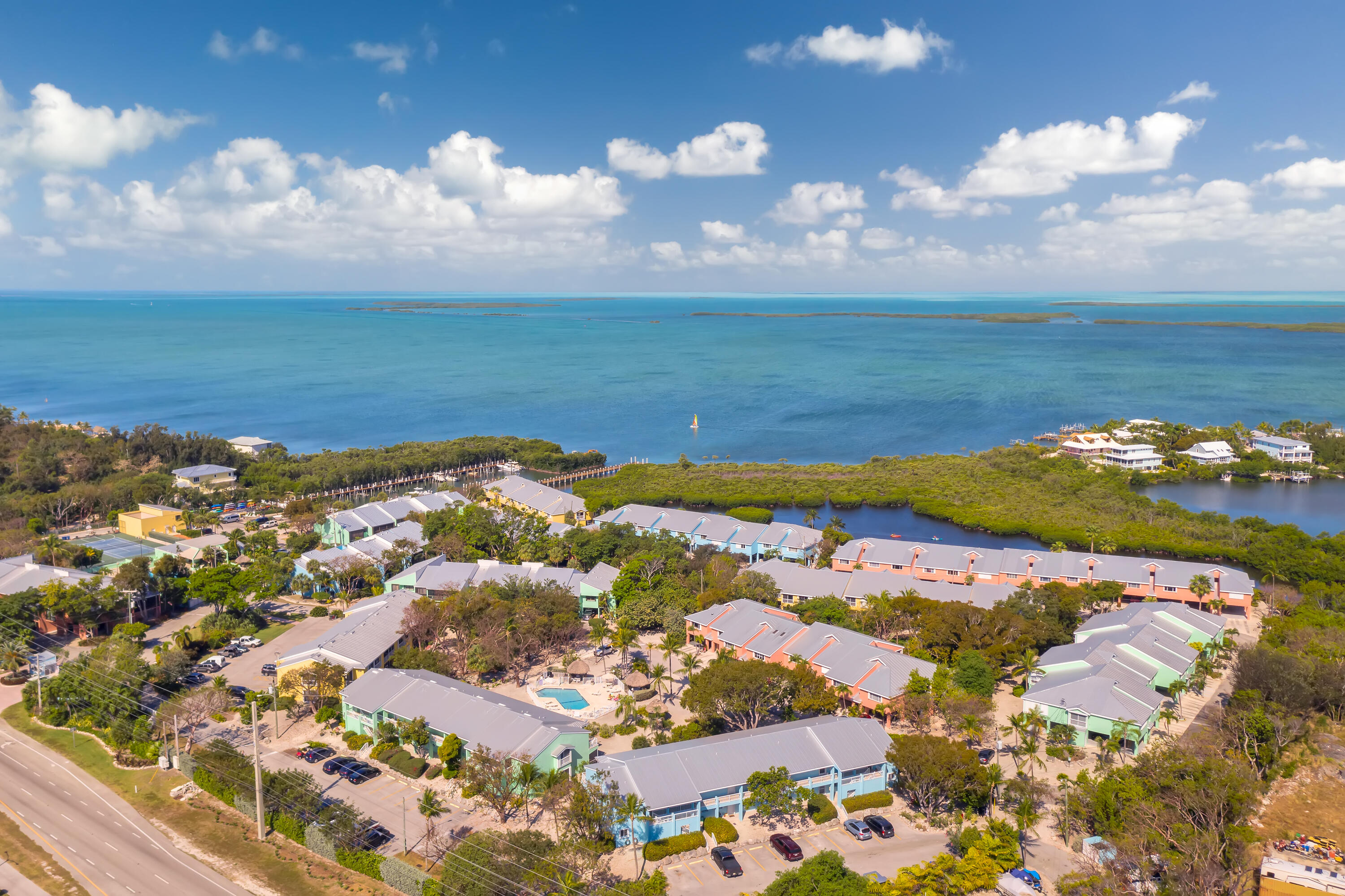 9871 Leeward Avenue Key Largo, FL 33037 - Photo 38 of 38 an aerial view of ocean and residential houses with outdoor space