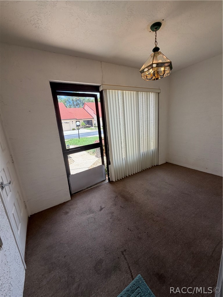 2080 Forest Drive Inverness, FL 34453 - Photo 16 of 37 Front enclosed porch