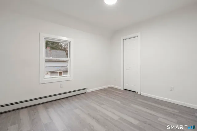 an empty room with a workbench
