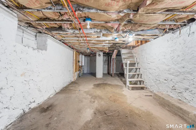 a view of a room with wooden walls