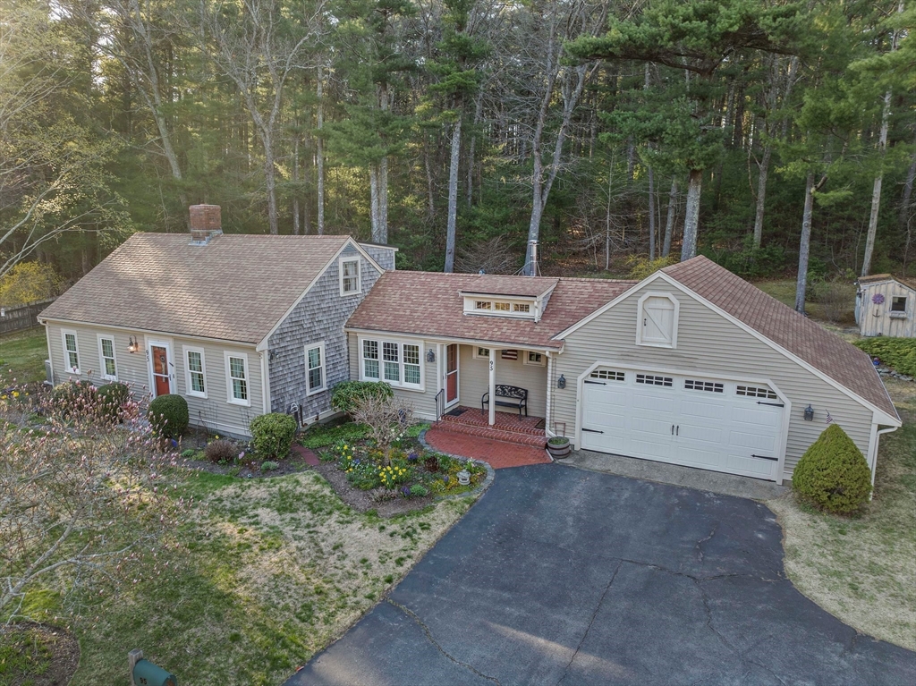 95 Wapping Road Kingston, MA 02364 - Photo 1 of 42 a view of a house with a yard and large trees