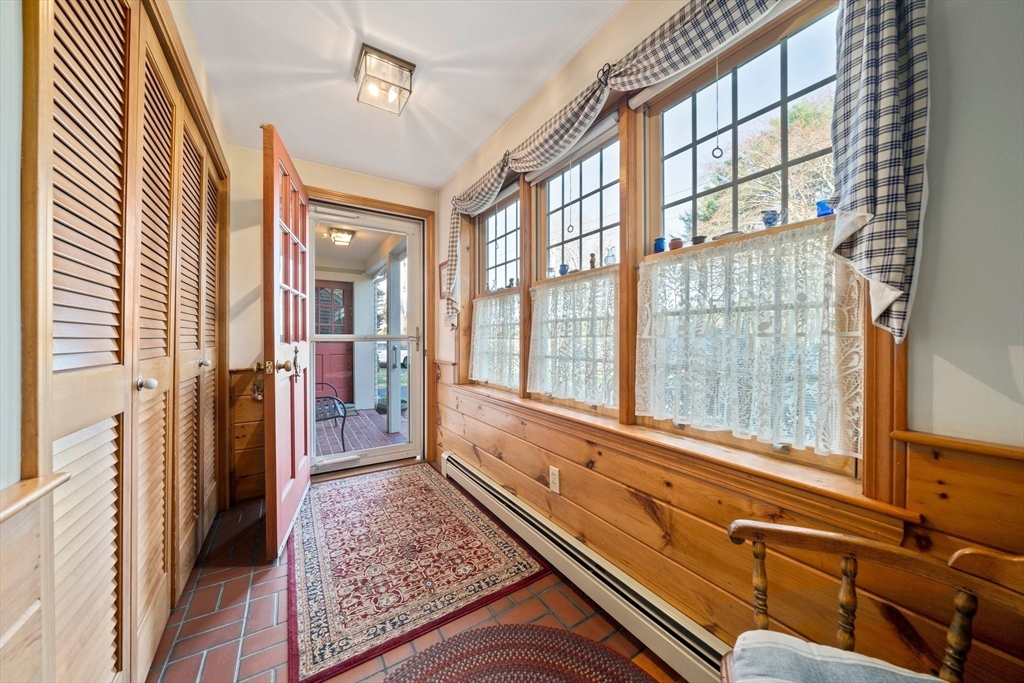 95 Wapping Road Kingston, MA 02364 - Photo 18 of 42 a room with large windows