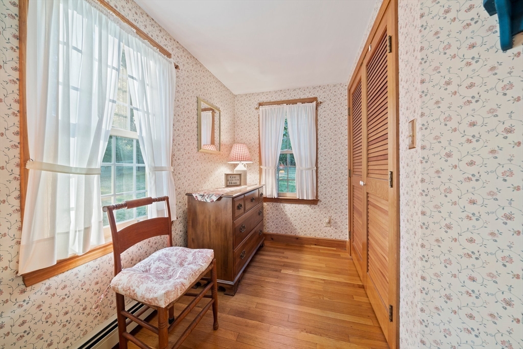 95 Wapping Road Kingston, MA 02364 - Photo 19 of 42 a view of a dining room with furniture and wooden floor