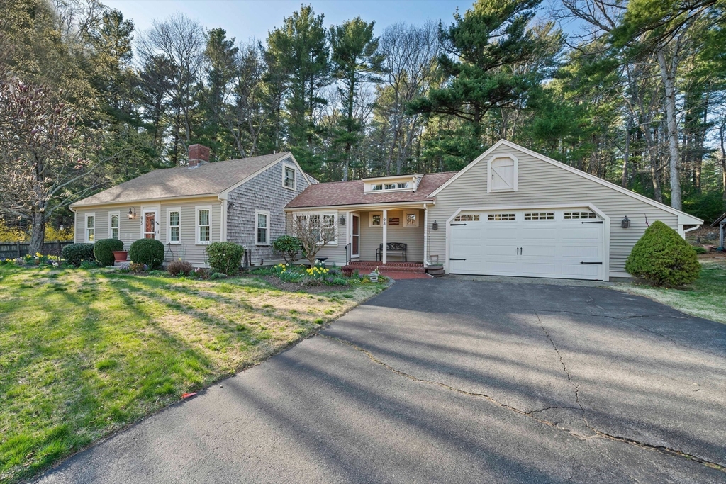 95 Wapping Road Kingston, MA 02364 - Photo 2 of 42 a front view of a house with a yard