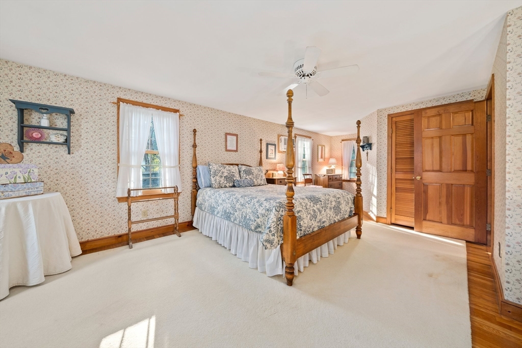 95 Wapping Road Kingston, MA 02364 - Photo 21 of 42 a bedroom with a large bed and a window